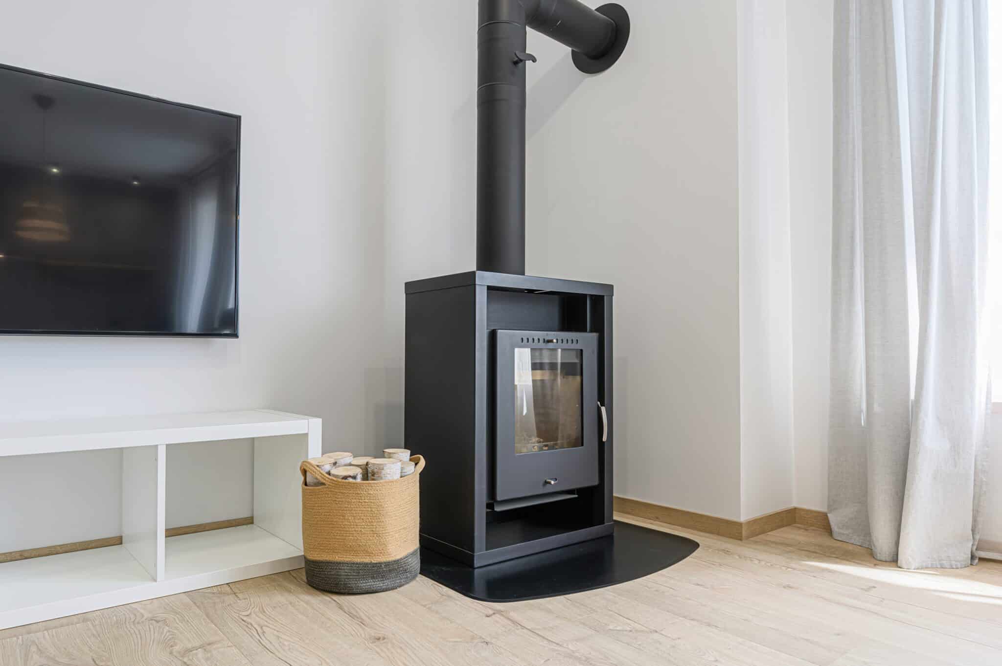 Modern,Living,Room,Featuring,A,Black,Wood-burning,Stove,,A,Tv,